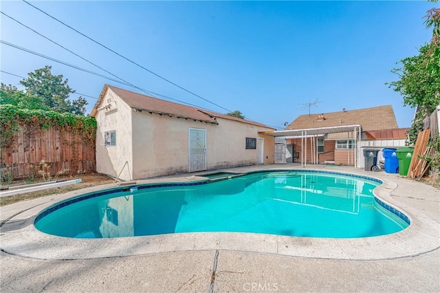 view of pool with a fenced backyard and a fenced in pool