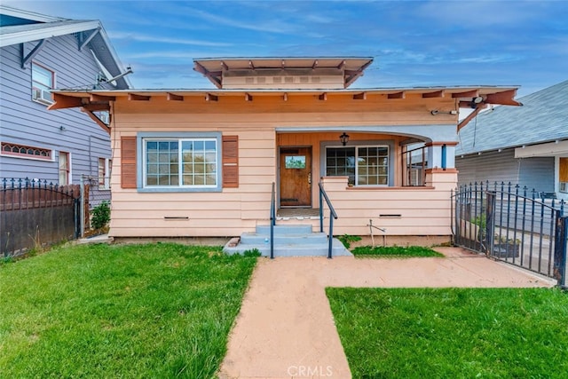 view of front of house featuring covered porch and a front yard