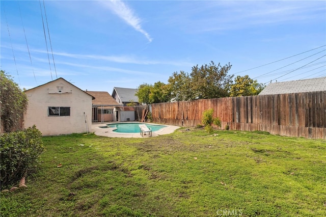 view of yard with a fenced in pool and a fenced backyard