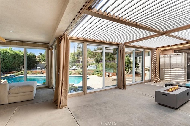 unfurnished sunroom with a wealth of natural light