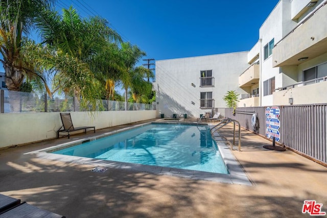 view of pool with a patio