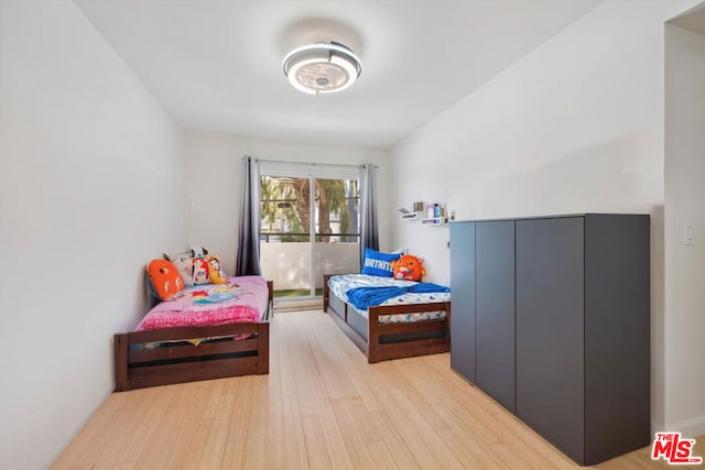 bedroom with light hardwood / wood-style floors