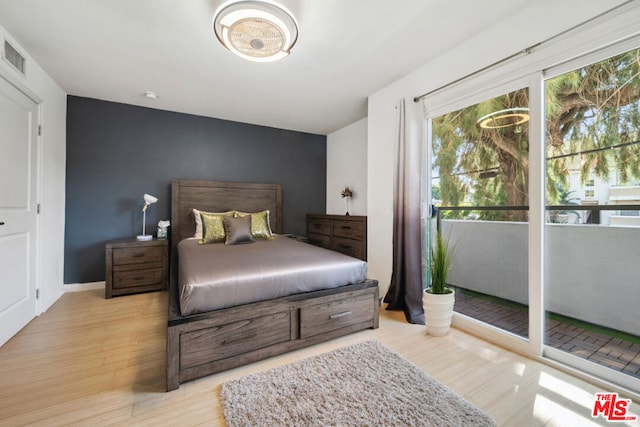 bedroom featuring light hardwood / wood-style floors