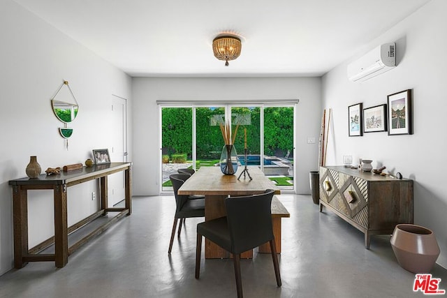 dining room featuring a wall mounted AC