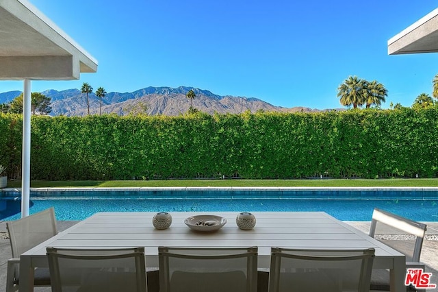 view of pool featuring a mountain view