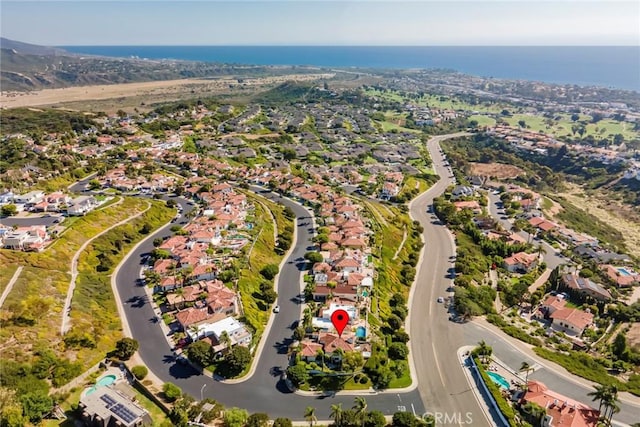 aerial view with a residential view and a water view