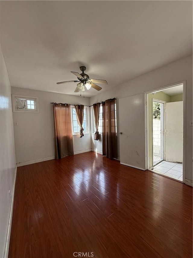 unfurnished room featuring light hardwood / wood-style flooring and ceiling fan