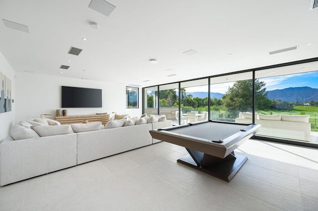 playroom featuring pool table and expansive windows