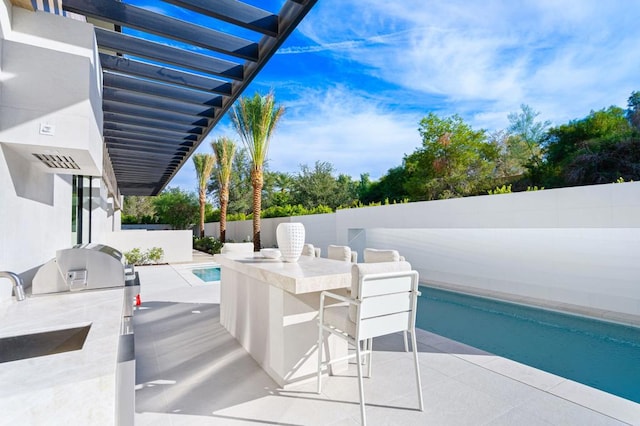 view of patio / terrace with an outdoor kitchen