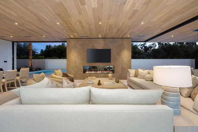 cinema room with wood ceiling