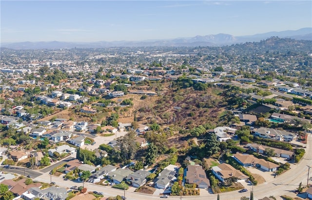 drone / aerial view featuring a mountain view