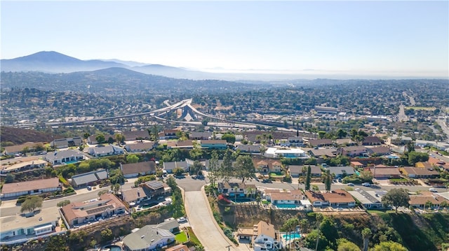 drone / aerial view featuring a mountain view