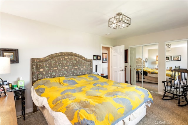 bedroom featuring a closet and carpet