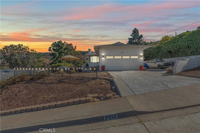 view of front of home with a garage