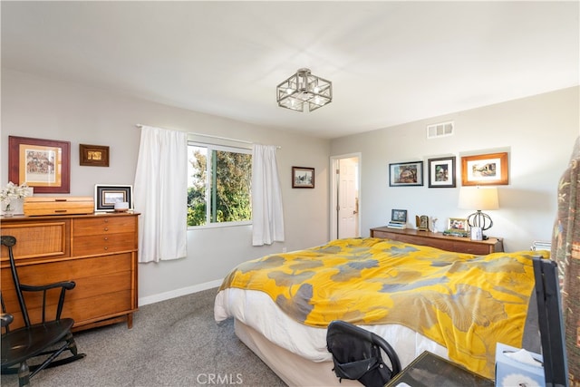 bedroom featuring light colored carpet