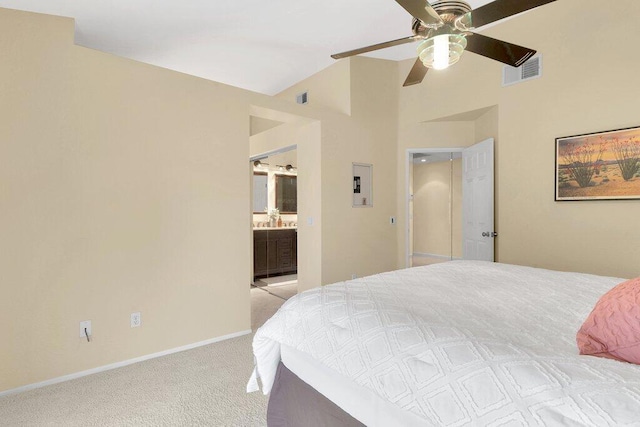 carpeted bedroom with connected bathroom and ceiling fan