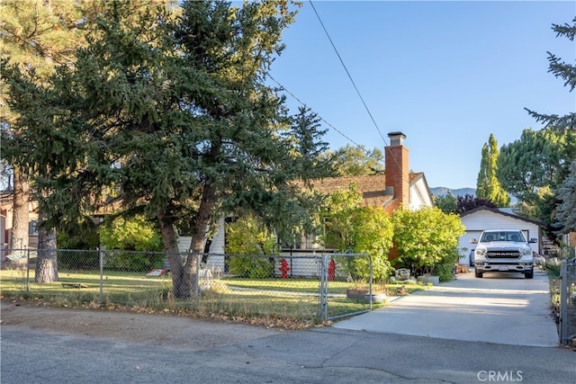 view of property hidden behind natural elements