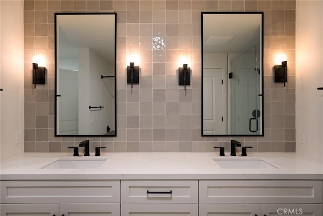 bathroom featuring decorative backsplash and vanity