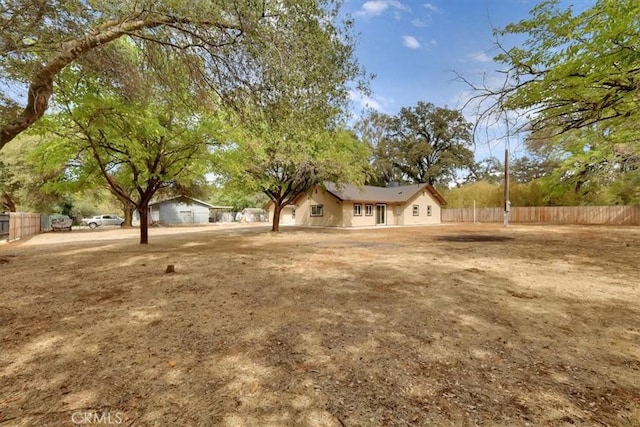 view of yard with fence