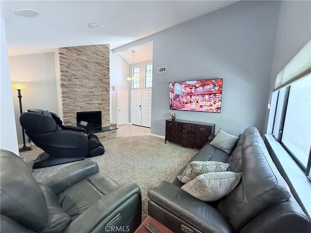1732 Winston Ave, Upland, CA 91784 - carpeted living area with high vaulted ceiling, a stone fireplace, and baseboards