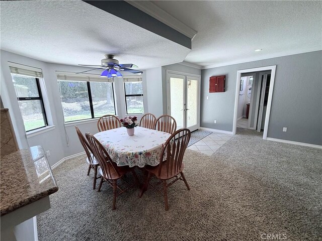 1732 Winston Ave, Upland, CA 91784 - dining space featuring a textured ceiling, light colored carpet, french doors, healthy amount of natural light, and baseboards