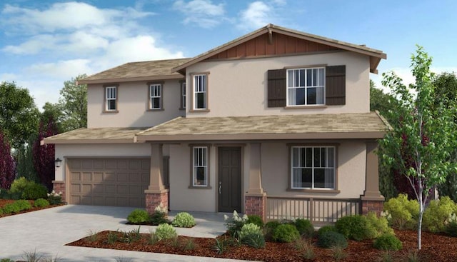 view of front of house featuring a garage and a porch