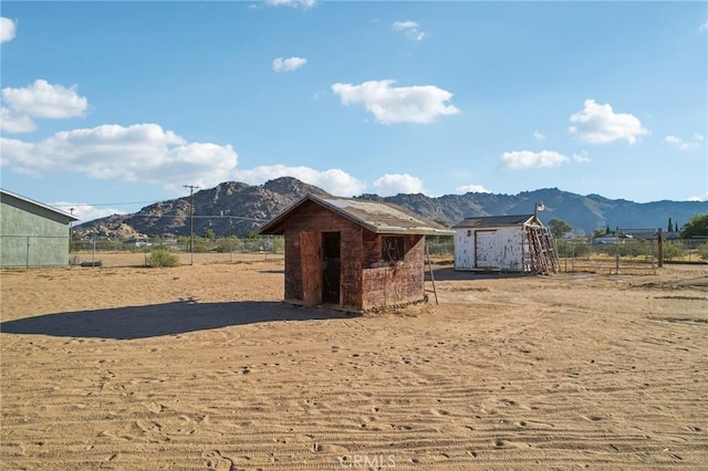 view of mountain feature with a rural view