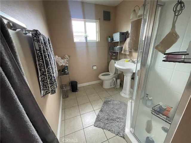 bathroom with walk in shower, tile patterned flooring, and toilet