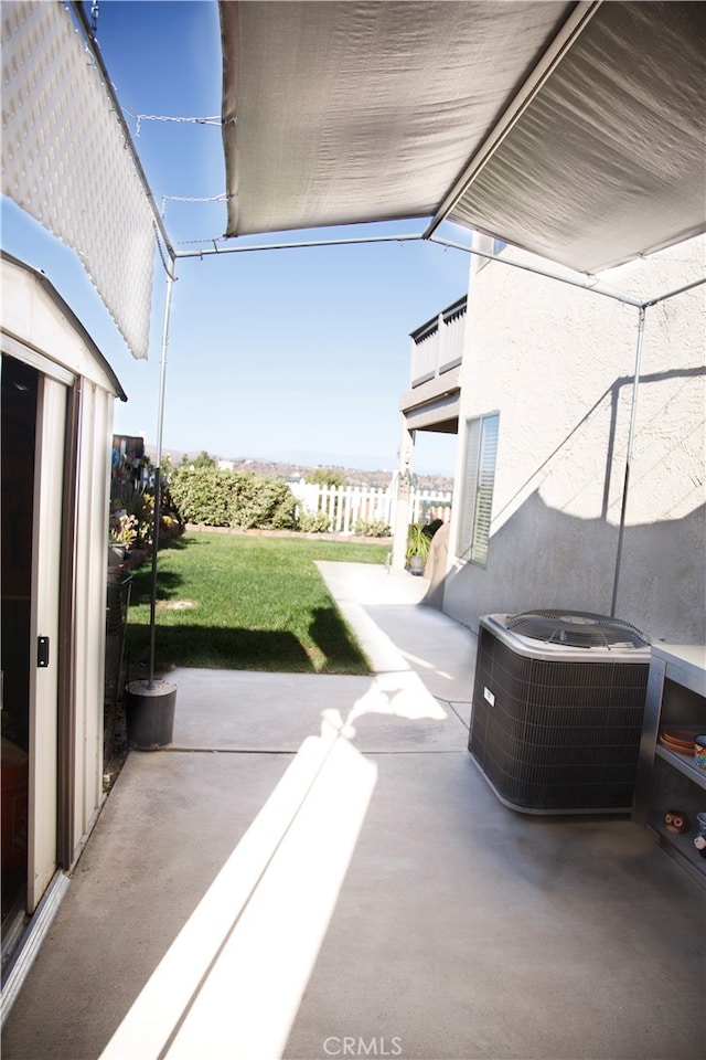 view of patio / terrace with central AC unit