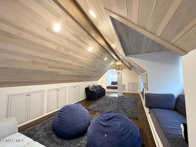 additional living space with dark hardwood / wood-style flooring, lofted ceiling, and wood ceiling