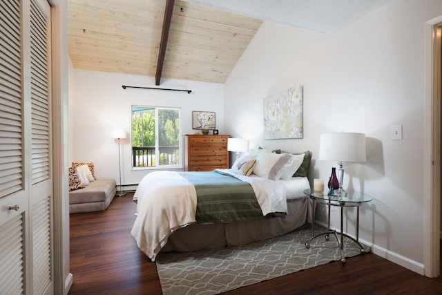 bedroom with lofted ceiling with beams, a closet, dark wood-type flooring, and a baseboard radiator