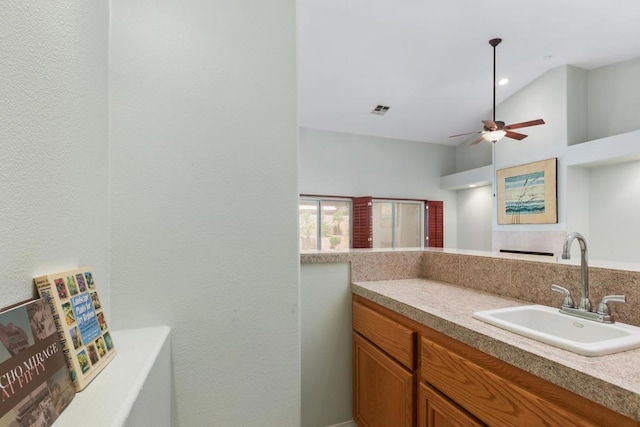 bathroom featuring vanity and ceiling fan