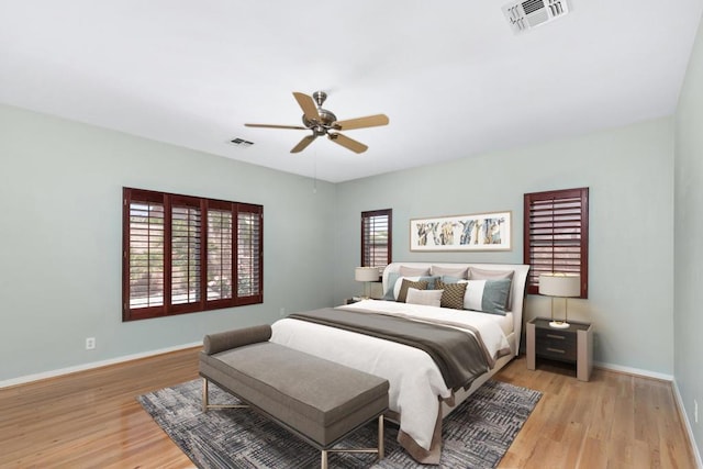 bedroom featuring ceiling fan and light hardwood / wood-style flooring