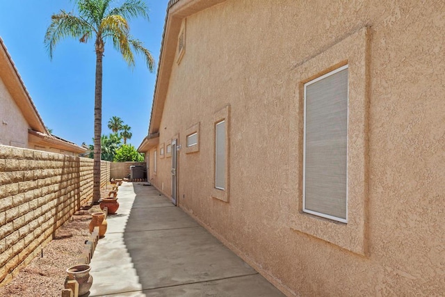 view of property exterior featuring a patio