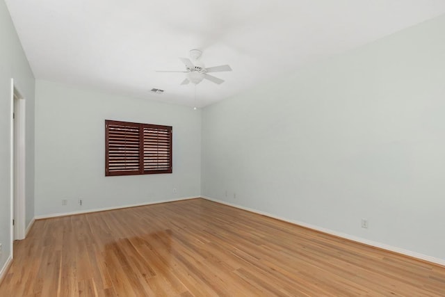 unfurnished room with ceiling fan and light hardwood / wood-style floors