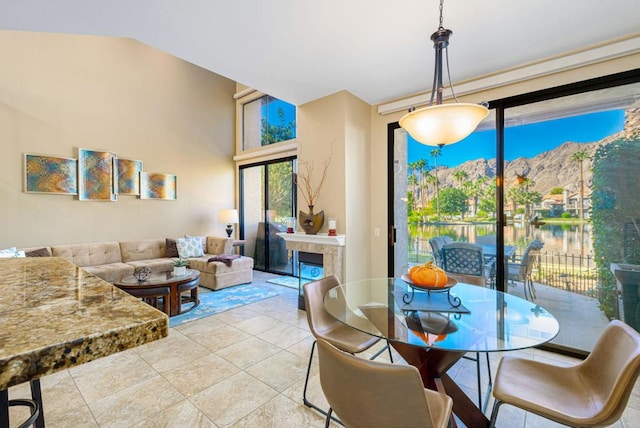 tiled dining area with a mountain view