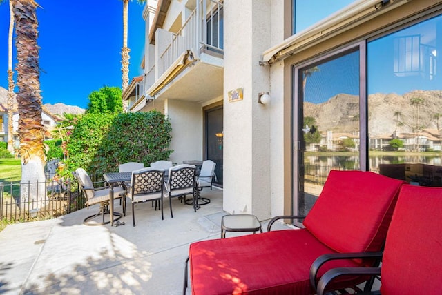 view of patio with a mountain view