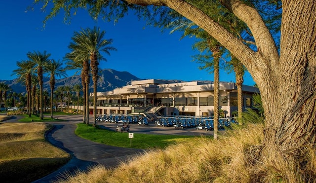 view of building exterior with a mountain view