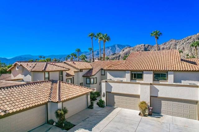 view of front of property with a mountain view