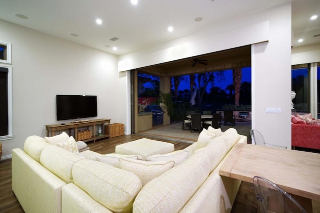 living room featuring dark hardwood / wood-style flooring