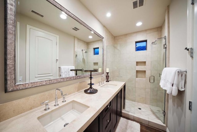 bathroom featuring vanity and walk in shower