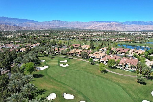 birds eye view of property featuring a water and mountain view