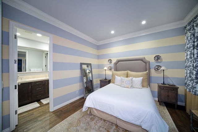 bedroom featuring dark hardwood / wood-style floors, ensuite bath, crown molding, and sink