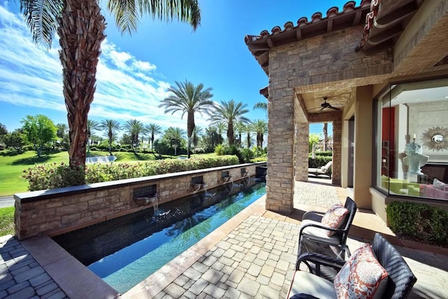 view of patio with pool water feature