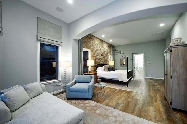 bedroom featuring dark hardwood / wood-style floors