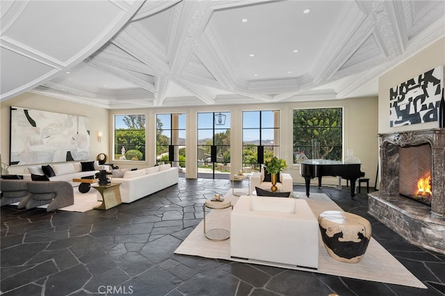 living room with ornamental molding, a fireplace, and coffered ceiling