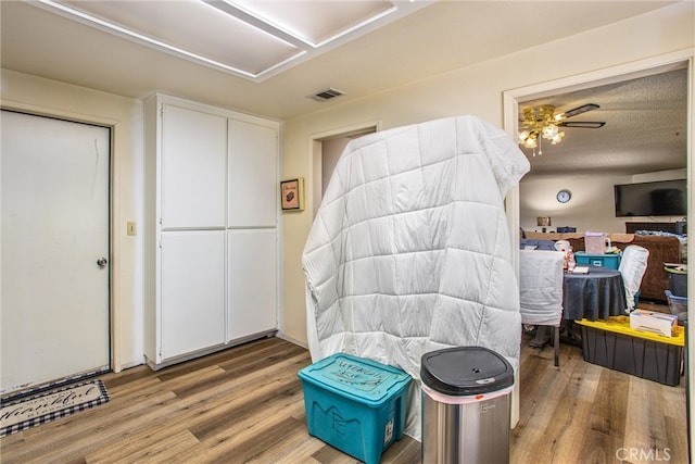 interior space featuring ceiling fan and hardwood / wood-style floors