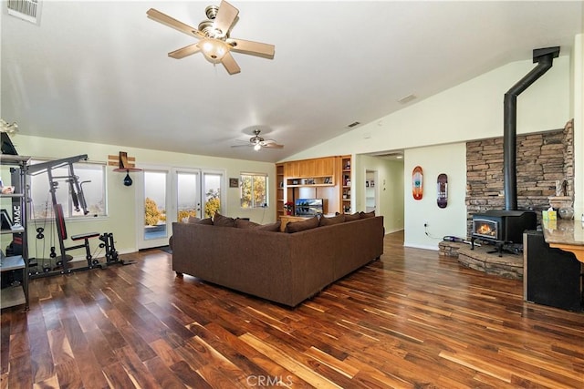 living room with dark hardwood / wood-style floors, ceiling fan, and lofted ceiling