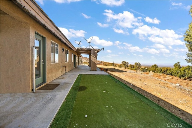 view of yard with a patio area