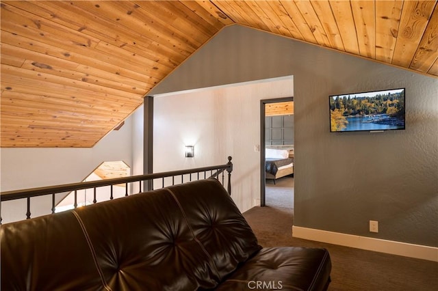 interior space with carpet flooring, vaulted ceiling, and wooden ceiling